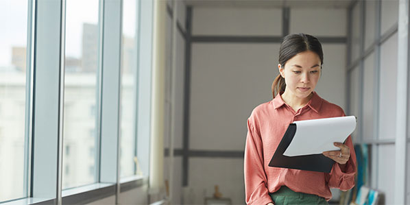 How does outsourced payroll ensure compliance with tax regulations and laws?